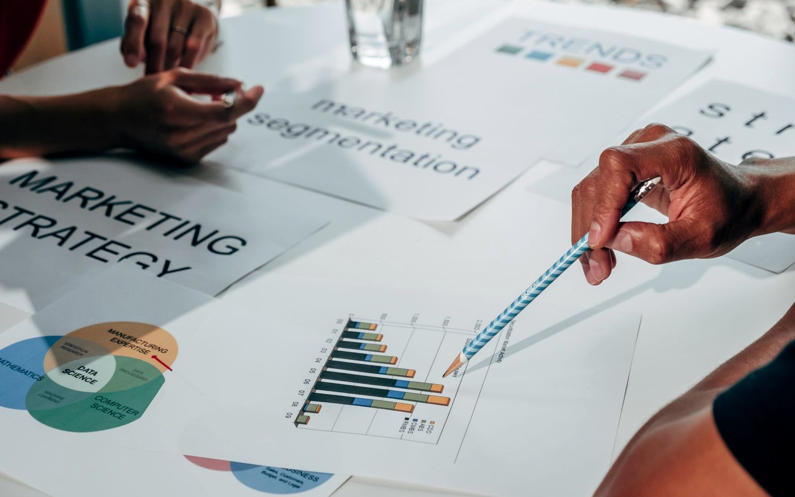 Marketing strategy documents with campaign charts and planning notes